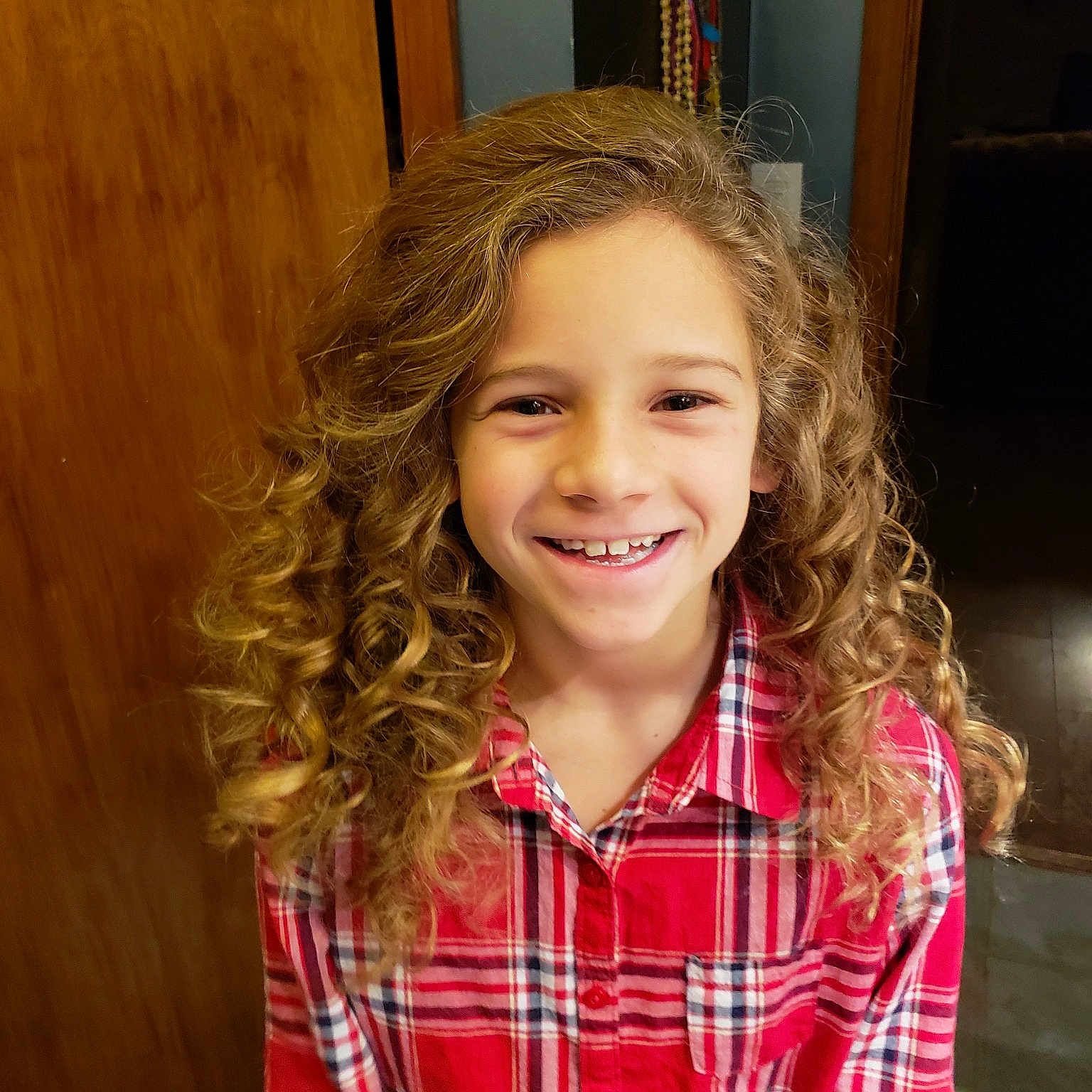 Koralyn joined the competition — help win amazing prizes! brown_hair, cheek, child, child_model, day, eye, facial_expression, girl, hair, hairstyle, happiness, human_hair_color, joy, long_hair, organ, pattern, person, plaid, smile, tartan