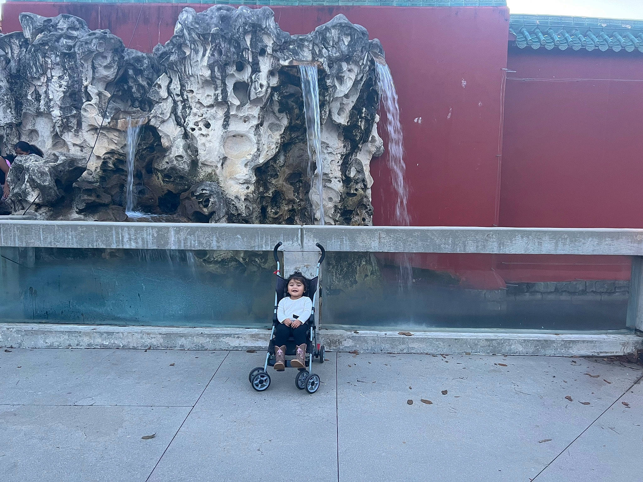 Khaleesi joined the competition — help win amazing prizes! architecture, art, asphalt, baby_carriage, city, concrete, facade, graffiti, leisure, person, road, road_surface, rolling, sidewalk, tire, toddler, tree, visual_arts, wall, wheel