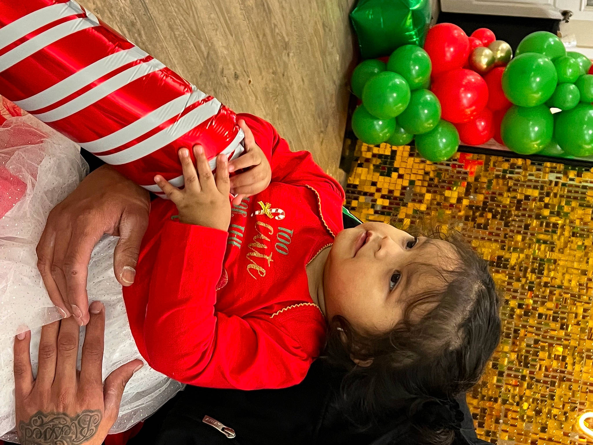 Khaleesi joined the competition — help win amazing prizes! balloon, child, elbow, event, fun, green, happy, human_leg, leisure, natural_foods, party_supply, people_in_nature, person, play, sitting, thigh, toddler