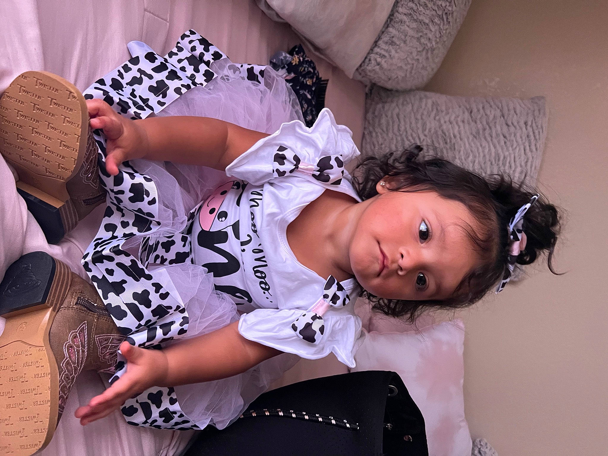 Khaleesi is registered to the contest to win money with this photo: black_hair, brown_hair, child, comfort, cool, eyelash, fashion_design, human_body, human_leg, joint, long_hair, magenta, mouth, neck, pattern, person, pink, purple, skin, thigh