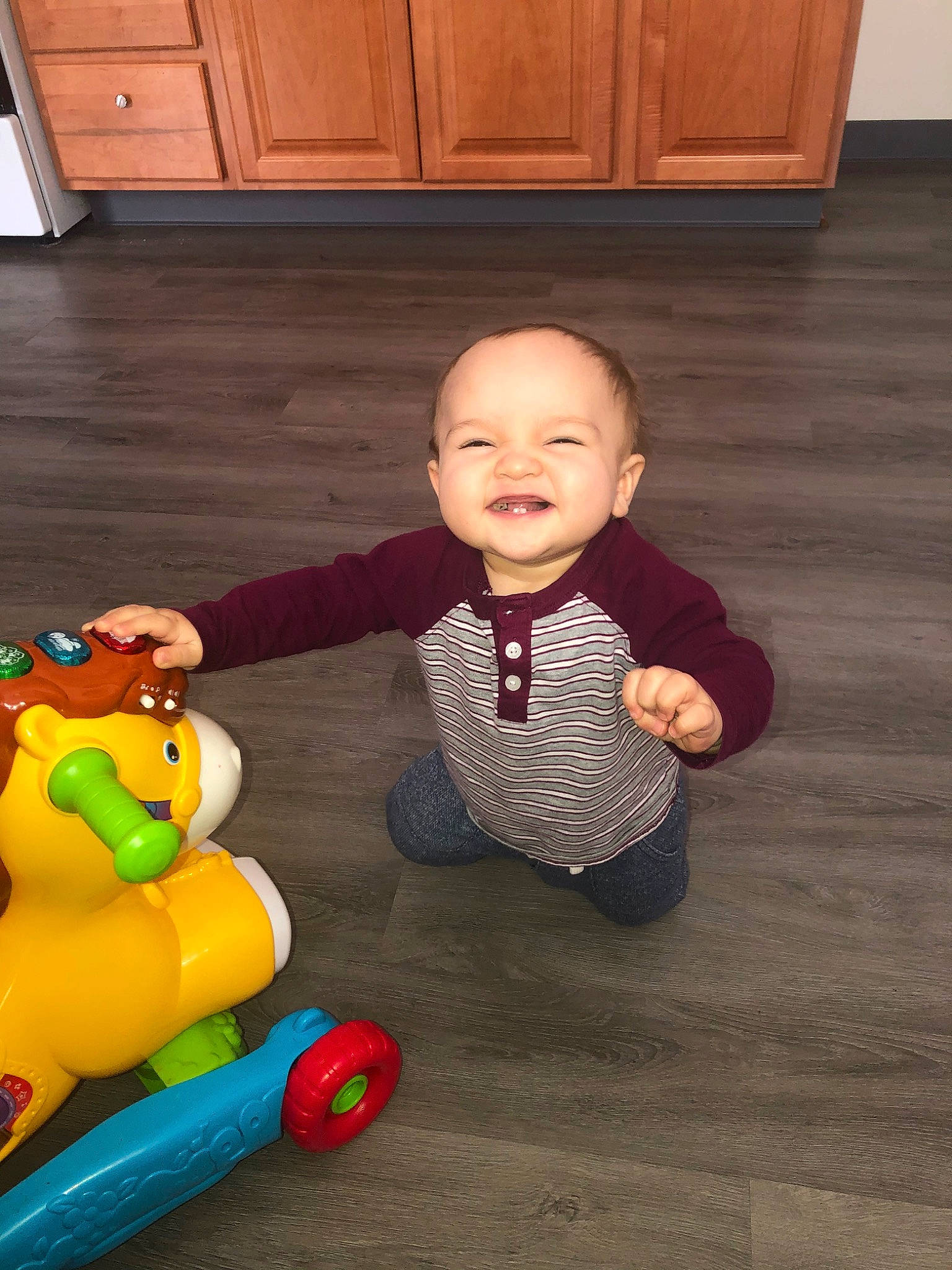 Malikai is registered to the contest to win money with this photo: baby, baby_playing_with_toys, baby_toys, child, floor, flooring, person, play, skin, toddler, toy