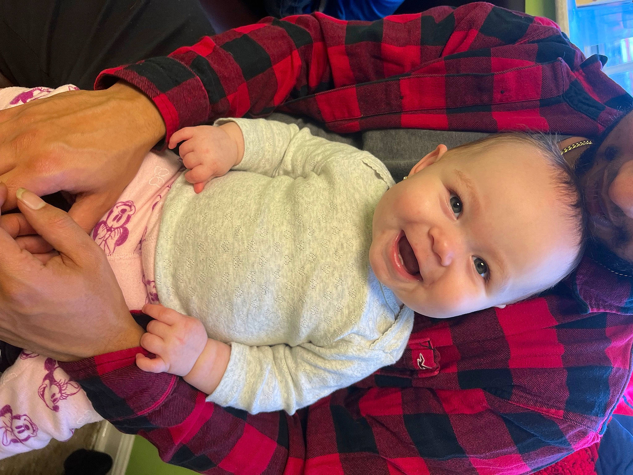 Noelle Alya joined the competition — help win amazing prizes! baby, baby_toddler_clothing, cheek, child, comfort, fun, gesture, happy, joy, lap, pattern, person, plaid, red, sitting, sleeve, smile, tartan, textile, thumb