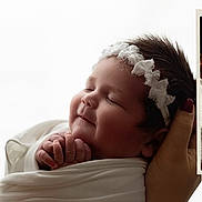 Giavonna joined the competition — help win amazing prizes! baby, blanket, child, closeup, cute, face, hand, headband, human, infant, newborn, peaceful, portrait, resting, skin, sleeping, smiling, soft_light, tenderness, wrapped