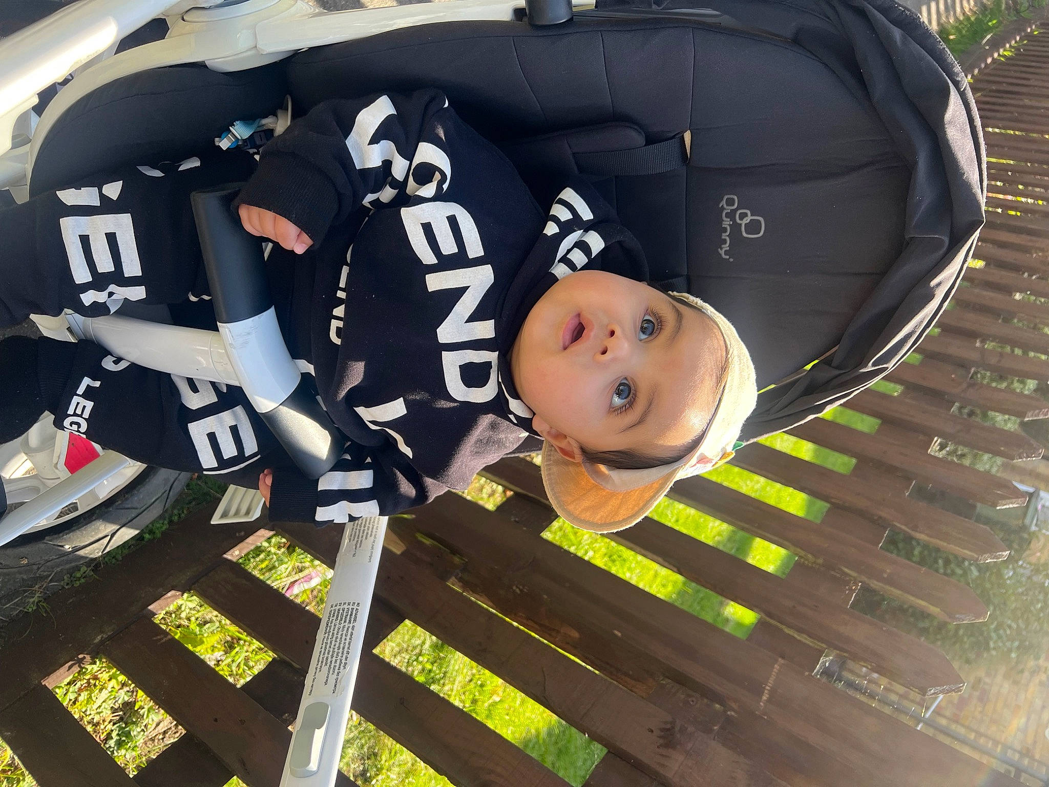 Zunair joined the competition — help win amazing prizes! baby, baby_carriage, baby_products, bag, child, fun, grass, happy, hat, leisure, person, personal_protective_equipment, recreation, smile, sports_gear, surprise, toddler, wood