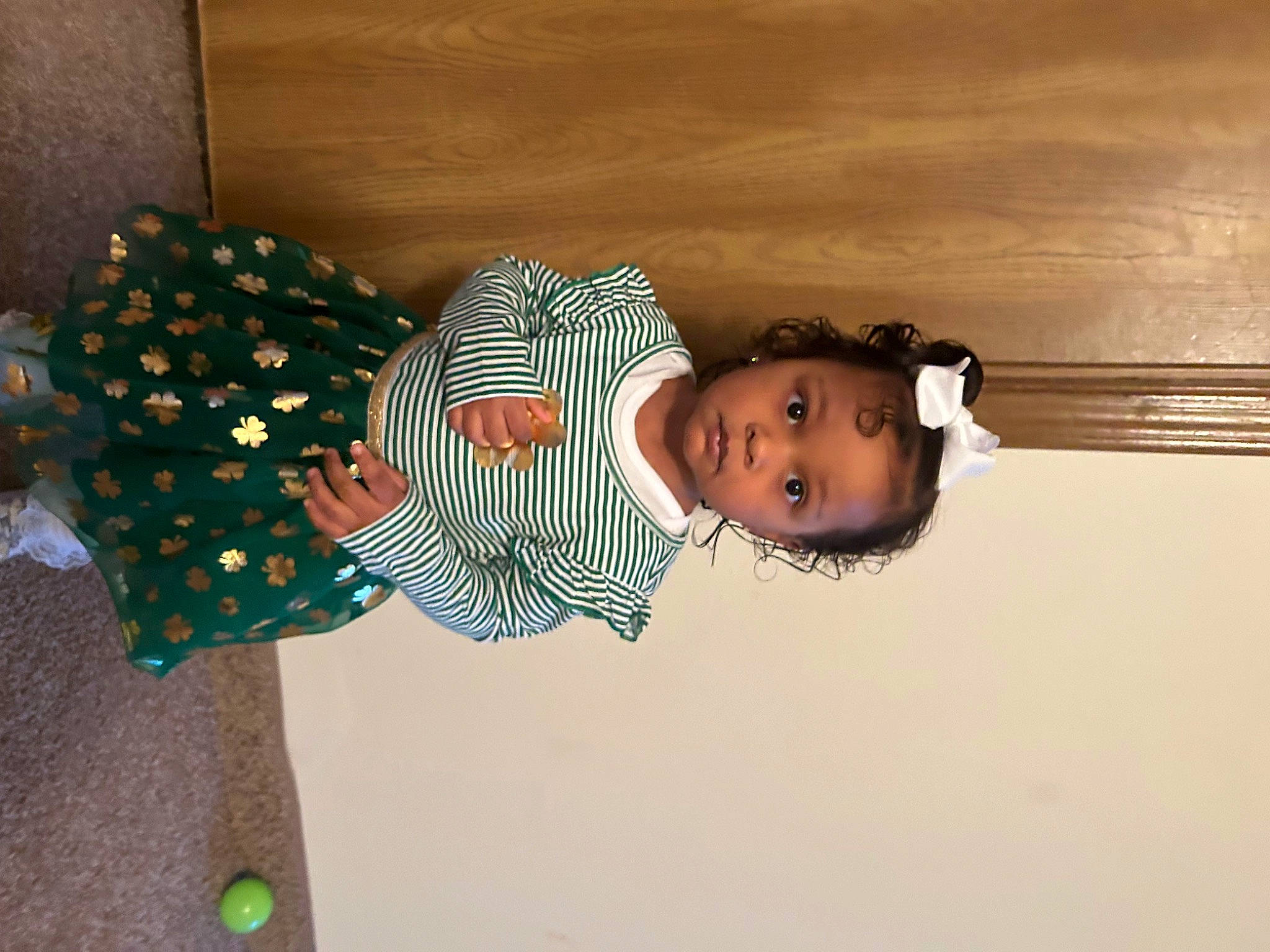 Brooklyn is registered to the contest to win money with this photo: baby, baby_toddler_clothing, fashion_accessory, floral_design, fun, happy, hat, holiday, pattern, person, room, toddler, wood