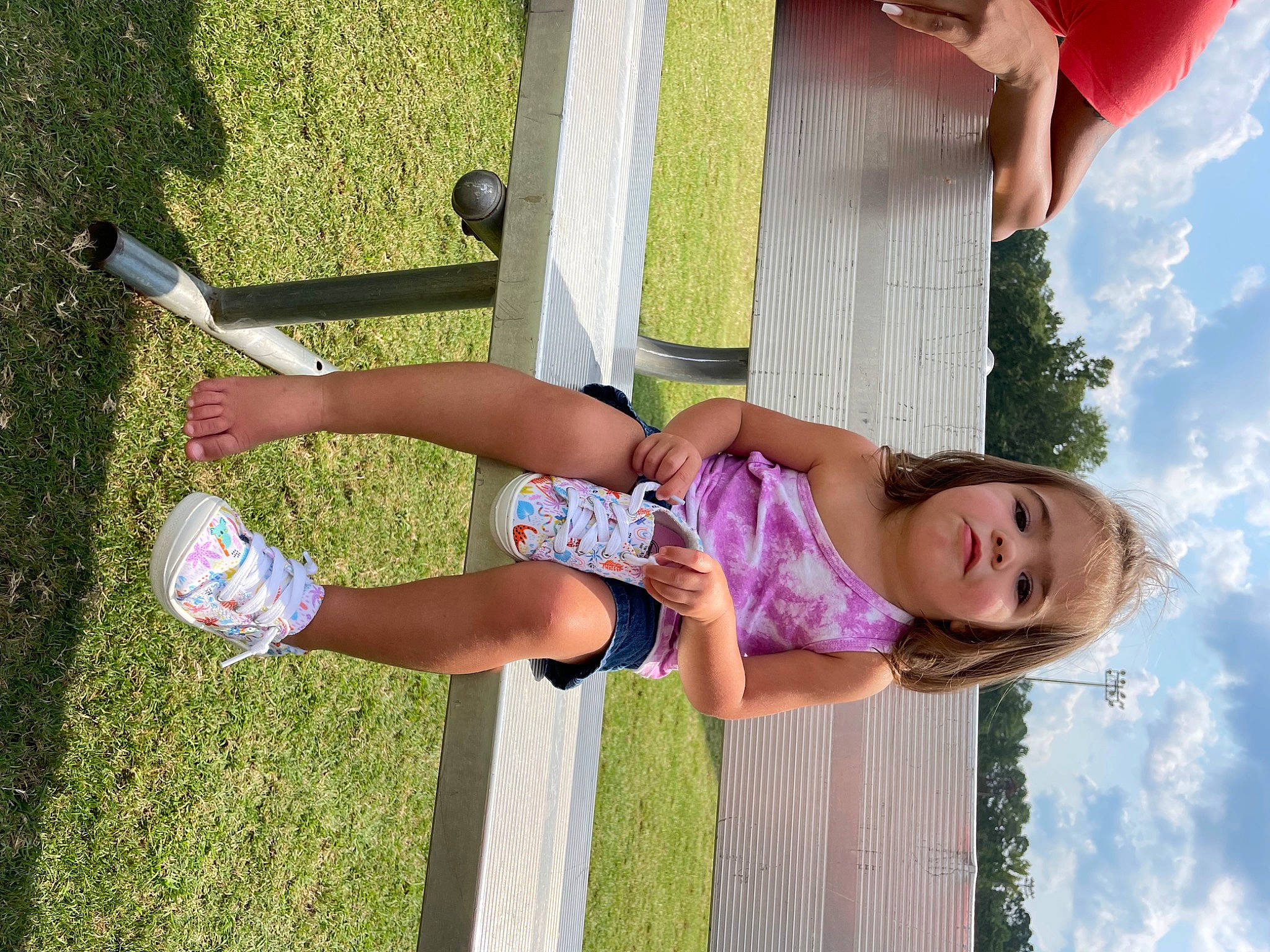 Jolene is registered to the contest to win money with this photo: cloud, fun, grass, green, hand, happy, knee, leisure, light, line, people, people_in_nature, person, pink, plant, recreation, sky, smile, summer, thigh
