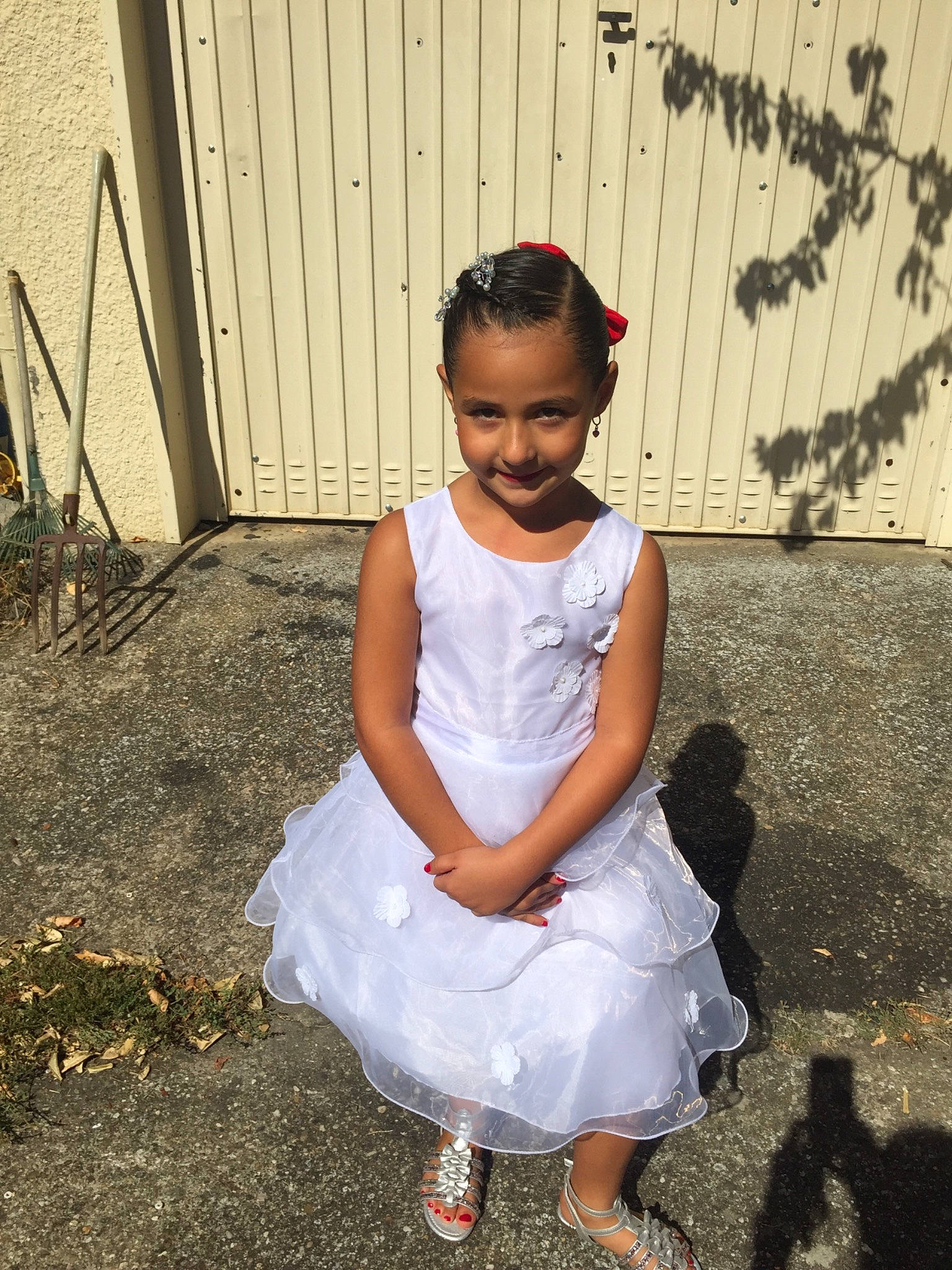 Déborah a rejoint le concours — aidez-le/la à gagner de superbes lots ! child, dress, footwear, happy, person, shoe, sitting, smile, vacation, white