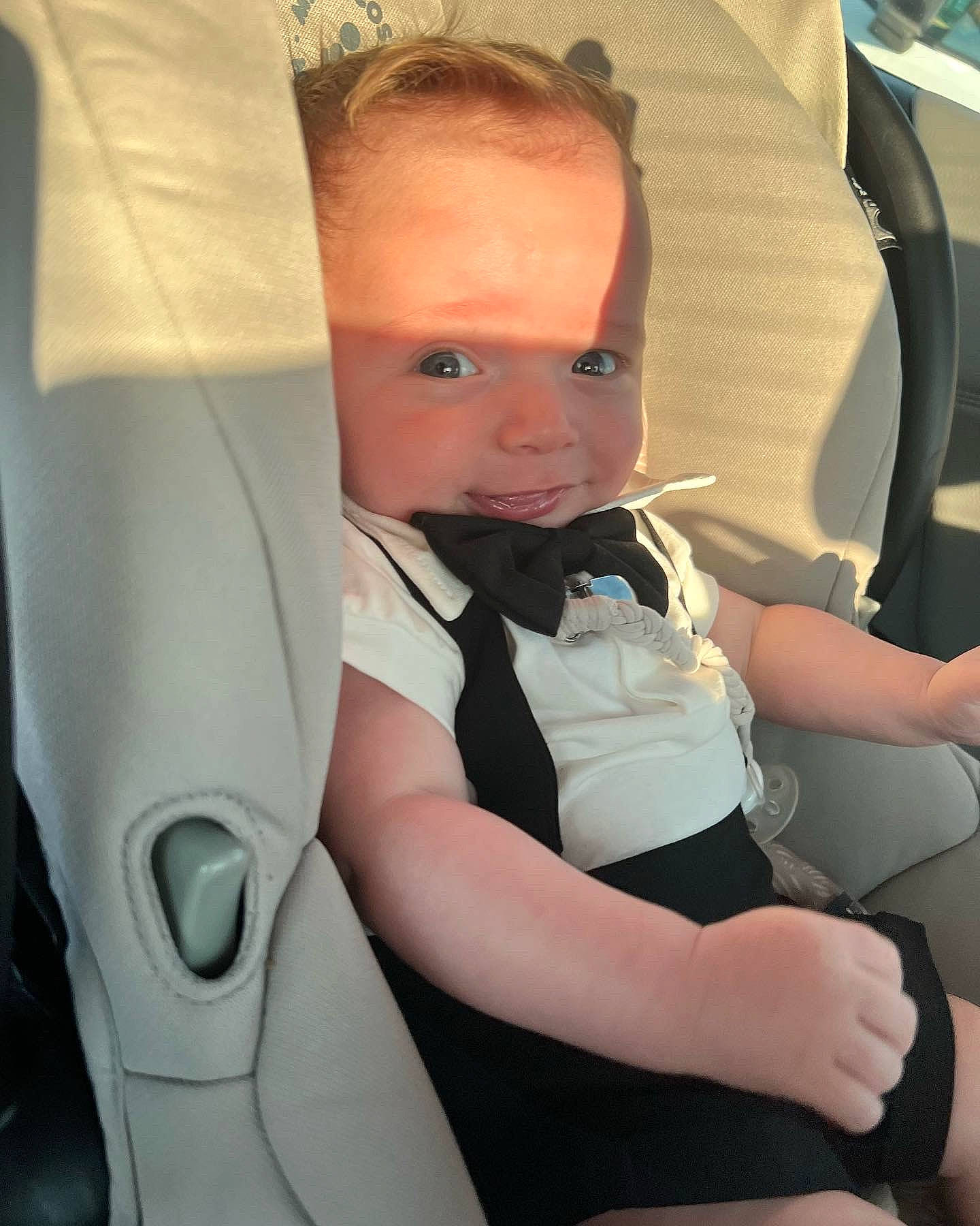 Shepherd is registered to the contest to win money with this photo: auto_part, automotive_design, baby_products, car_seat, car_seat_cover, child, comfort, family_car, fun, head_restraint, human_leg, joint, luxury_vehicle, motor_vehicle, person, personal_luxury_car, seat_belt, sitting, skin, toddler