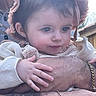 Kélya participe au concours pour gagner de l'argent avec cette photo : baby, child, hat, hand, arm, tattoo, bracelet, outdoor, fence, sky, clothing, portrait, closeup, person, cute, soft, expression, holding, warm, daylight