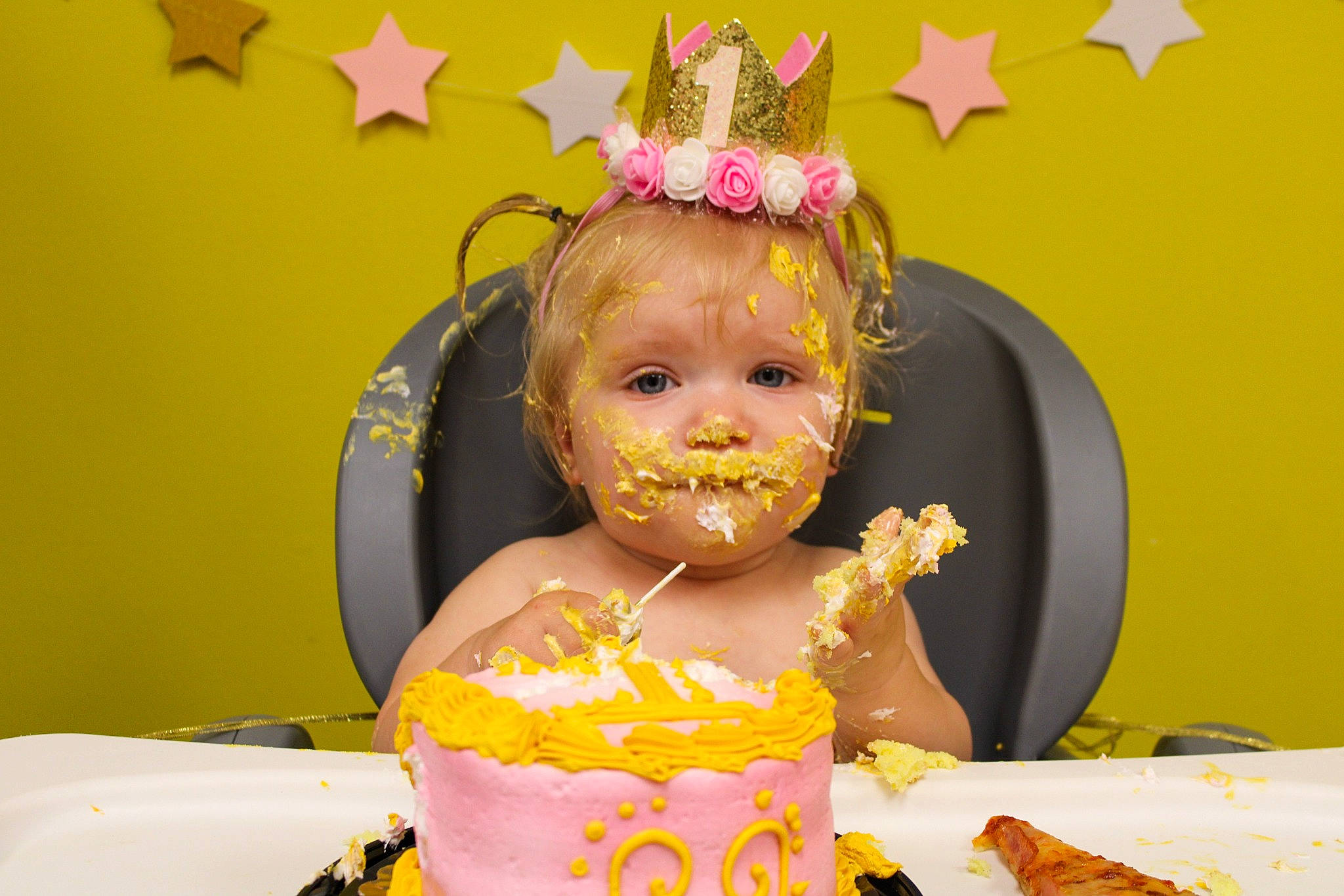 Fern is registered to the contest to win money with this photo: birthday, birthday_cake, birthday_candle, birthday_party, cake, cake_decorating, cake_decorating_supply, cuisine, event, food, fun, happy, icing, person, pink, plate, sharing, sugar_cake, table, toddler