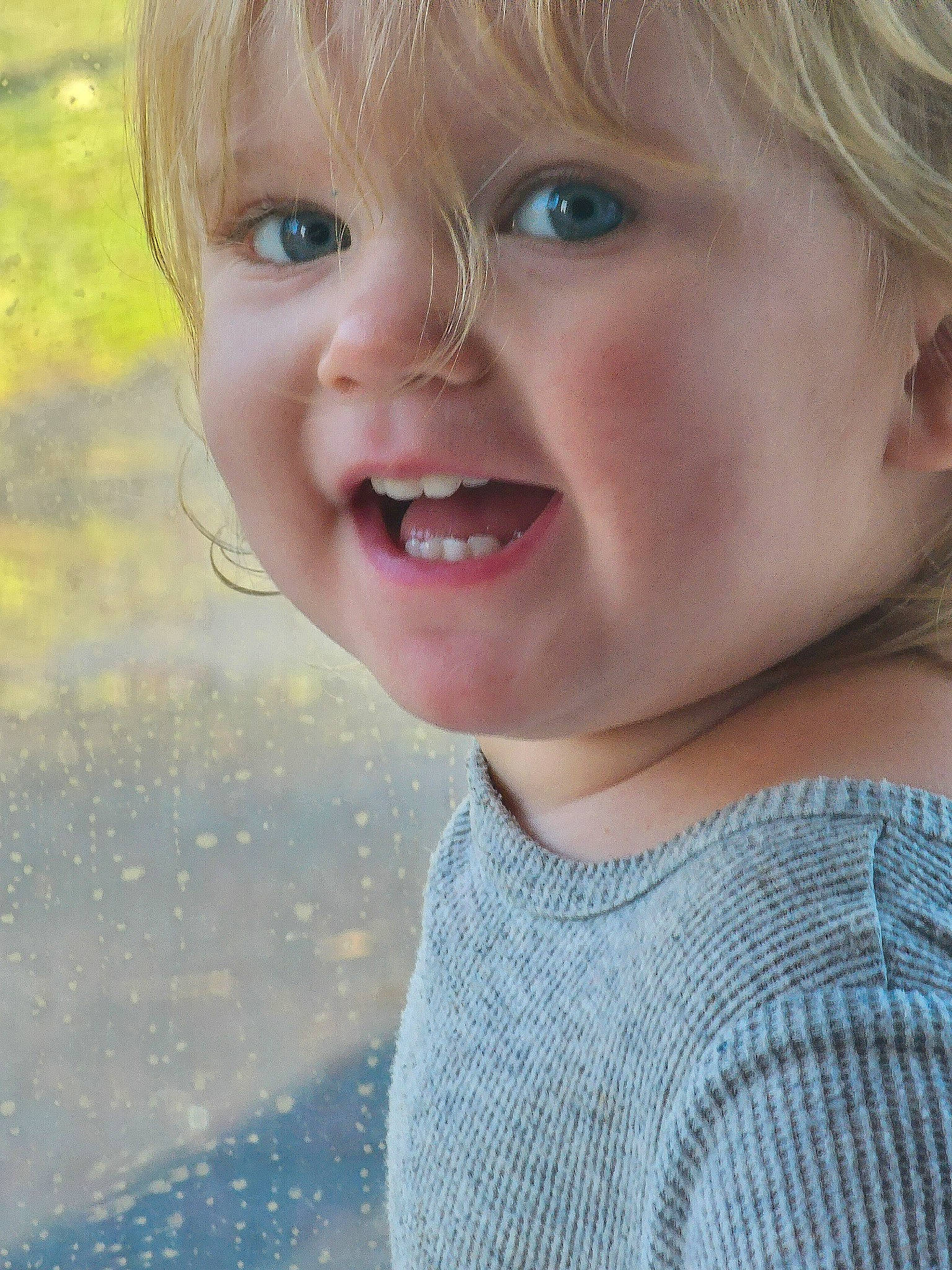 Fern joined the competition — help win amazing prizes! baby_toddler_clothing, blond, cheek, child, eye, facial_expression, fun, grass, happy, iris, lip, nose, people_in_nature, person, skin, sleeve, smile, summer, toddler, tooth