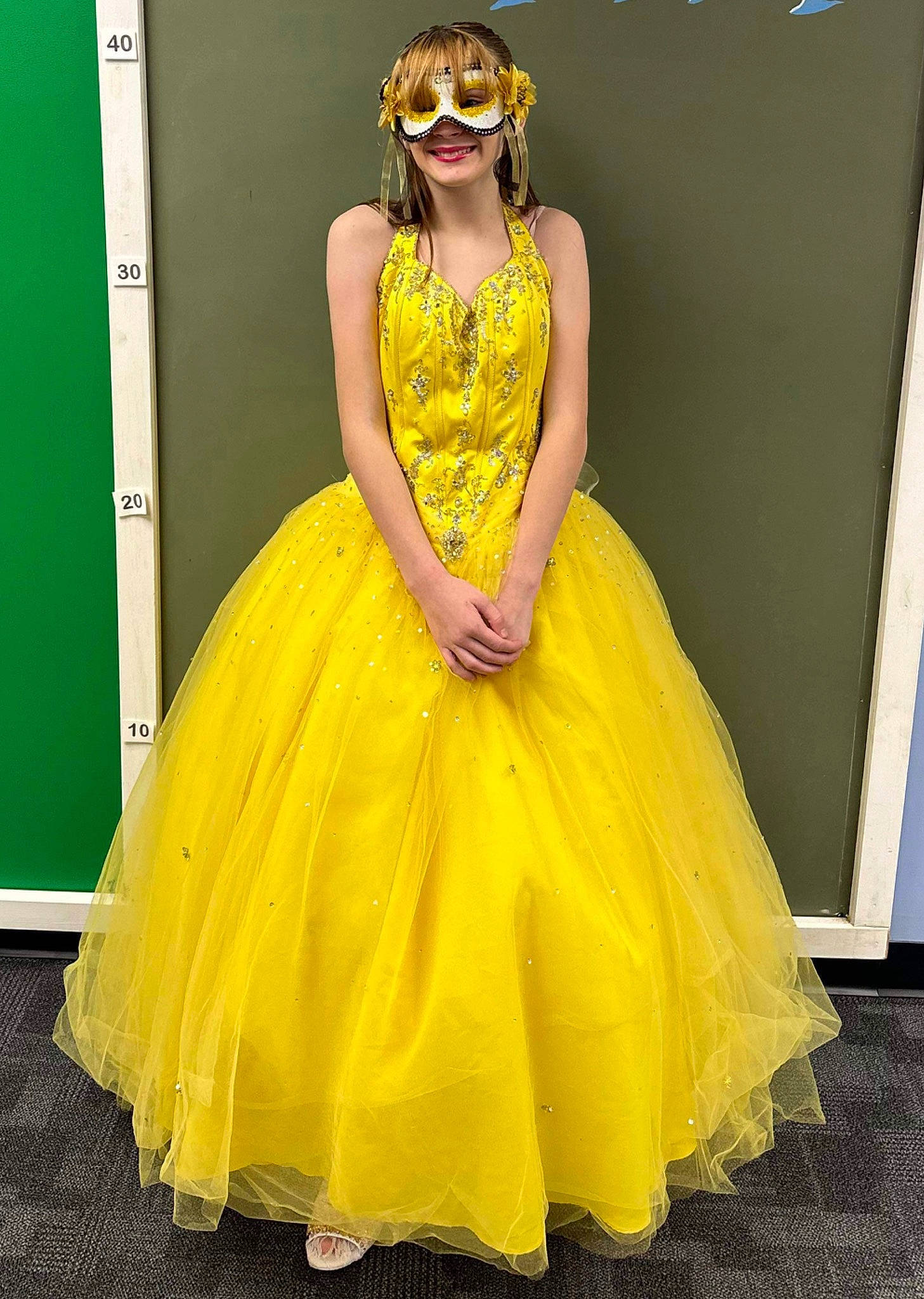 Haley is registered to the contest to win money with this photo: arm, bridal_party_dress, day_dress, dress, embellishment, face, fashion, fashion_design, fashion_model, gown, green, hair, hairstyle, head, joy, neck, one_piece_garment, person, shoulder, sleeve