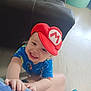 Roxas is registered to the contest to win money with this photo: baby, blue_shirt, child, couch, cute, floor, flooring, furniture, hand, happy, headwear, indoor, living_room, mario_hat, person, playful, red_hat, smiling, toddler, toy