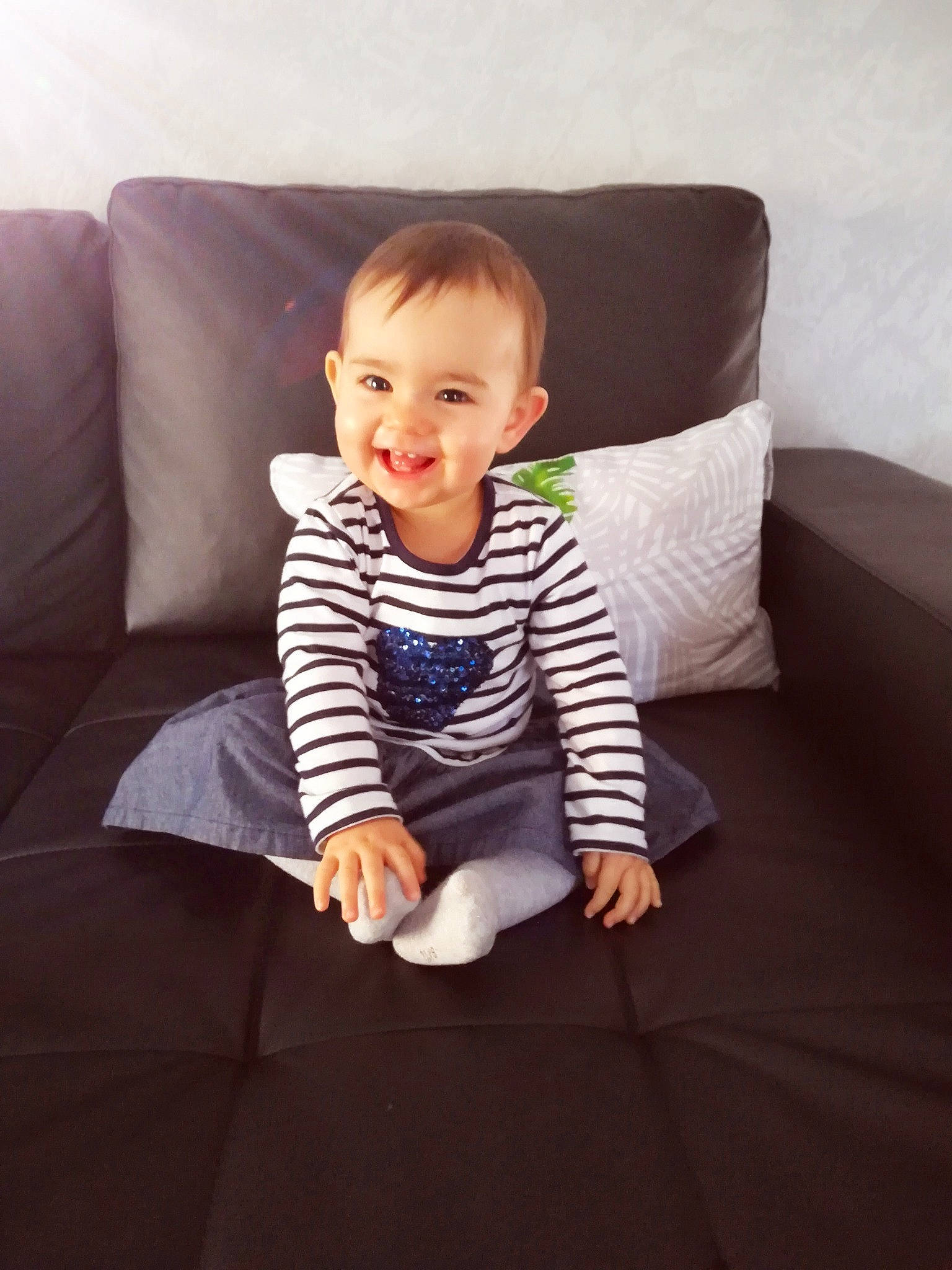 Elena participe au concours pour gagner de l'argent avec cette photo : boy, child, day, eye, furniture, girl, infant, joy, leg, outerwear, pattern, person, product, sitting, skin, smile, standing, textile, toddler