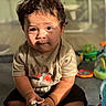 Emilio joined the competition — help win amazing prizes! toddler, child, baby, indoor, toy, play, curly_hair, sunlight, shadow, expression, clothing, floor, cute, hands, sitting, colorful, blurred_background, person, casual, playroom