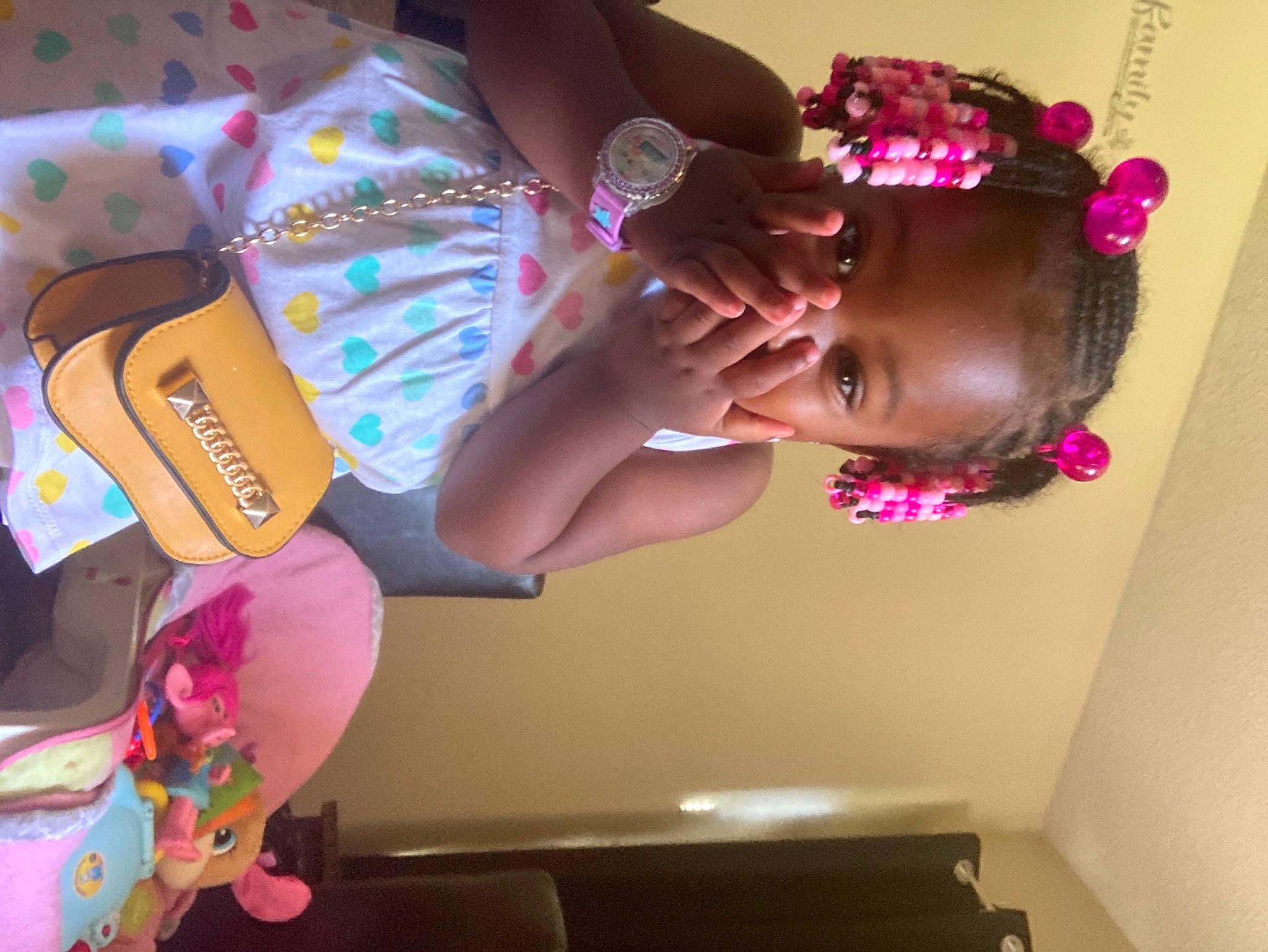 Brooklyn is registered to the contest to win money with this photo: cool, eyewear, fashion_accessory, finger, flesh, fun, hair_accessory, hair_coloring, headgear, headpiece, magenta, nail, party_supply, person, pink, purple, sweetness, thigh, toddler, violet