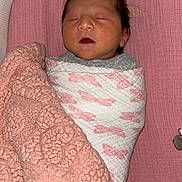 Adalynn joined the competition — help win amazing prizes! newborn, baby, sleeping, swaddle, blanket, pink, face, infant, cozy, soft, cute, child, resting, wrapped, young, bed, comfort, peaceful, portrait, indoors