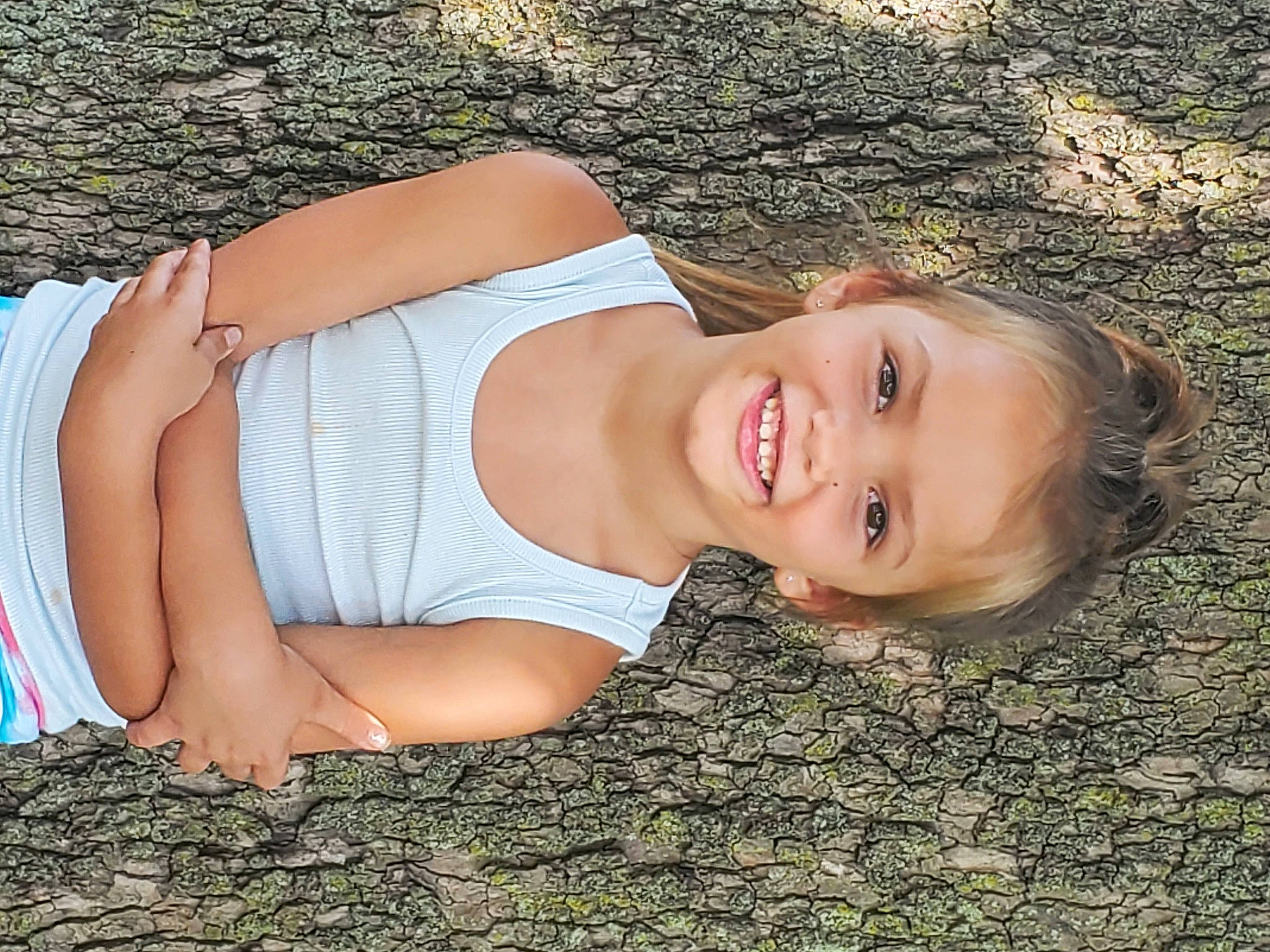 April is registered to the contest to win money with this photo: abdomen, black_hair, chest, elbow, flash_photography, grass, happy, human_body, human_leg, joint, joy, knee, lip, long_hair, neck, people_in_nature, person, shoulder, smile, thigh