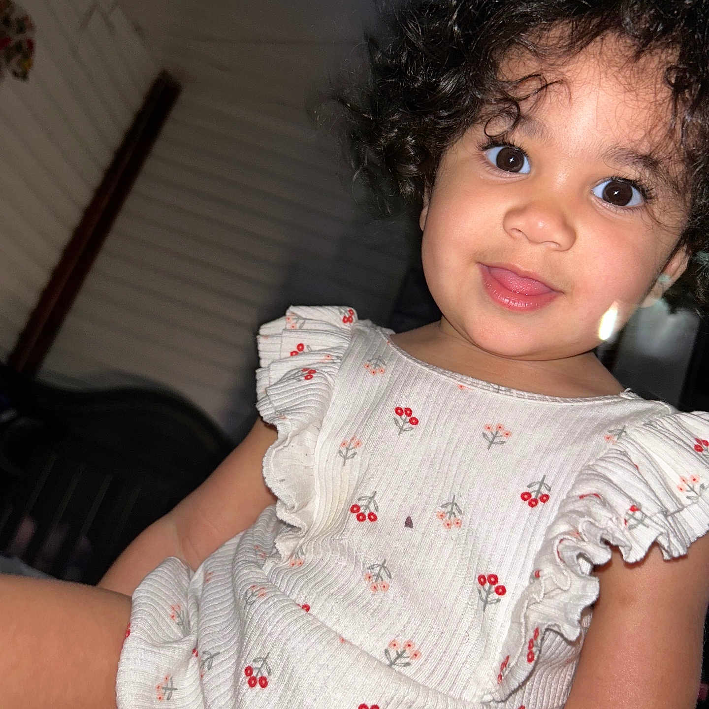 Egypt joined the competition — help win amazing prizes! child, toddler, portrait, curly_hair, smiling, tongue_out, indoor, flash_photography, close_up, face, eyes, dress, floral_pattern, ruffles, seated, candid, happy, baby, home, fashion