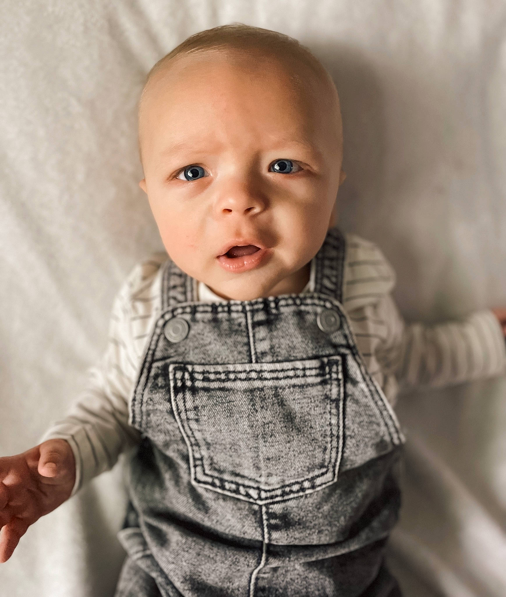 Tanner is registered to the contest to win money with this photo: baby, baby_toddler_clothing, cheek, child, collar, eye, eyelash, flash_photography, gesture, happy, head, iris, lip, nose, outerwear, pattern, person, skin, sleeve, toddler