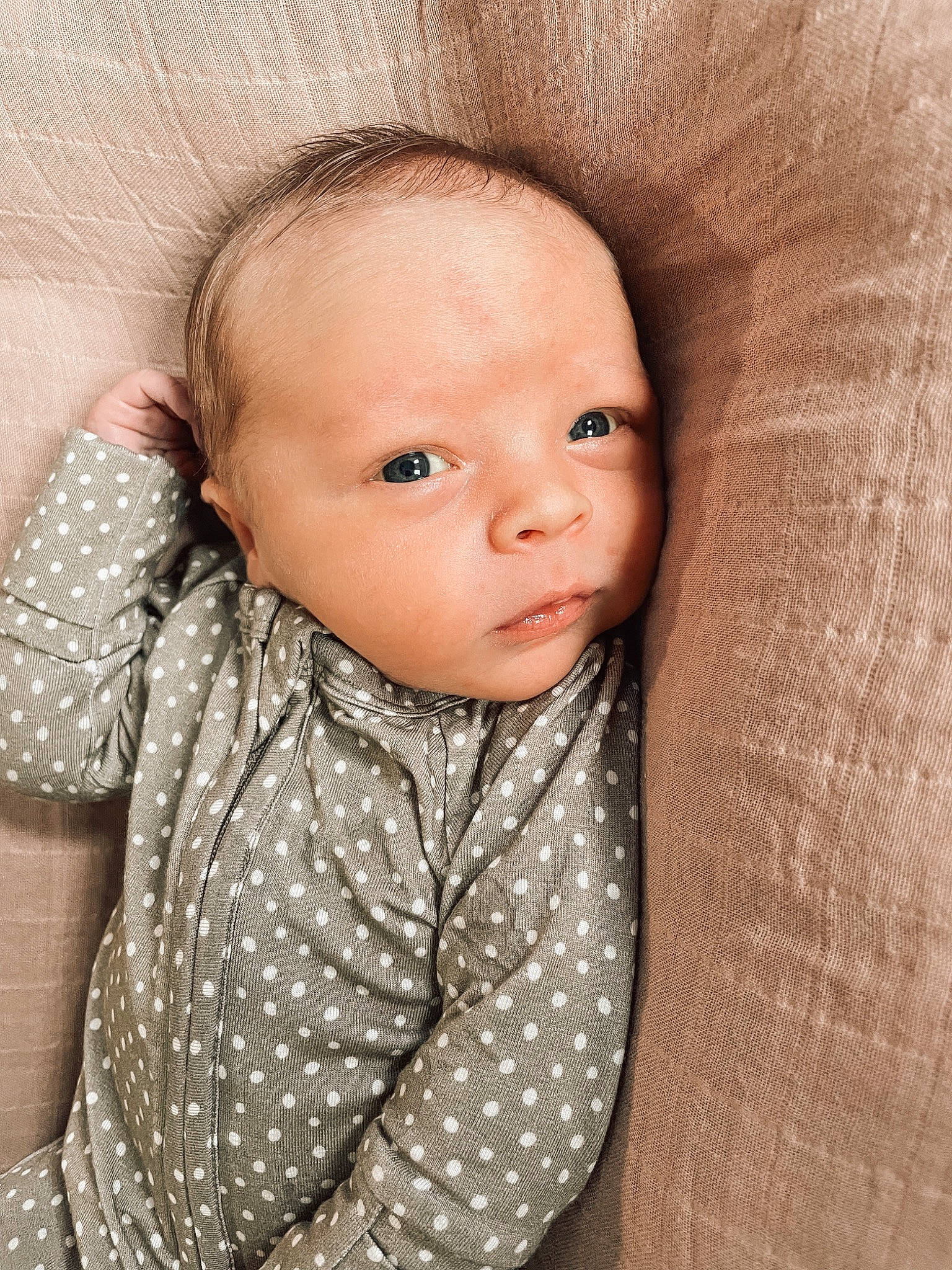 Tanner is registered to the contest to win money with this photo: baby, baby_toddler_clothing, cheek, child, chin, collar, comfort, eye, hairstyle, head, iris, lip, mouth, neck, nose, outerwear, person, skin, sleeve, textile