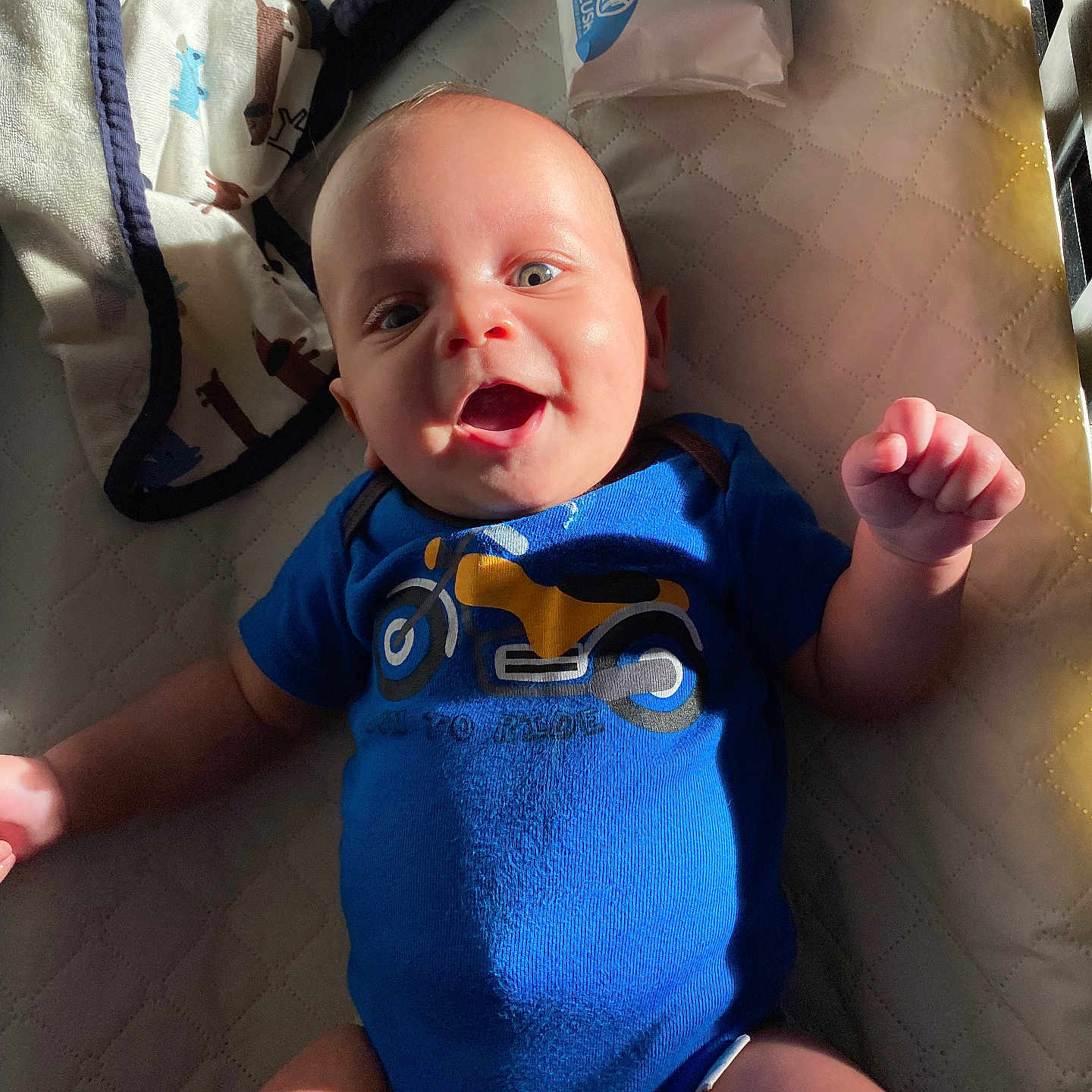 Jaxtyn is registered to the contest to win money with this photo: baby, bed, bedroom, bodypart, clothing, couch, cradle, crib, face, finger, furniture, hand, head, infantbed, mouth, newborn, person, photography, portrait, t_shirt