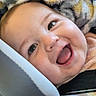 Noah is registered to the contest to win money with this photo: baby, baby_boy, baby_girl, blanket, car_seat, child, childhood, closeup, clothing, comfort, cute, face, happy, indoors, infant, person, portrait, seatbelt, smiling, young