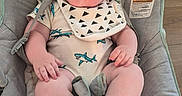 Noah joined the competition — help win amazing prizes! baby, baby_boy, baby_seat, bib, black_sock, child, clothing, cushion, cute, happy, indoor, infant, onesie, portrait, seat, shark_pattern, small_feet, small_hands, smiling, wooden_floor