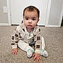 Sahib is registered to the contest to win money with this photo: baby, bodypart, clothing, coat, crawling, door, face, finger, hand, head, hosiery, jacket, knitwear, pants, person, photography, portrait, sitting, sock, sweater
