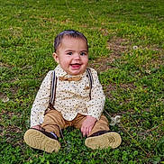 Sahib is registered to the contest to win money with this photo: boy, child, clothing, face, grass, head, herbal, herbs, lawn, male, nature, outdoors, pants, park, person, photography, plant, portrait, sitting, soil