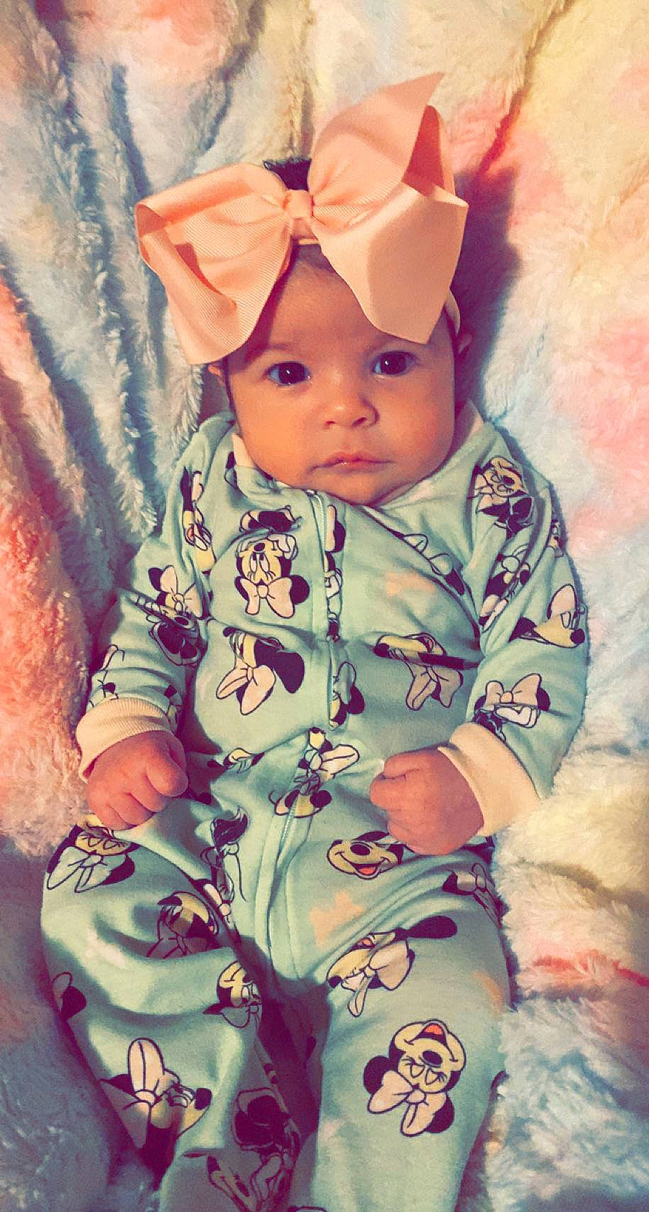 Rai'Nah joined the competition — help win amazing prizes! baby, baby_toddler_clothing, cap, cheek, child, cool, costume_hat, fun, happy, headwear, hood, human_body, jacket, magenta, pattern, person, pink, sitting, sleeve, t_shirt