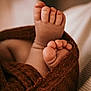 Judith participe au concours pour gagner de l'argent avec cette photo : baby, feet, toes, blanket, brown, close_up, soft, cozy, newborn, skin, infant, wrapped, warm, cute, small, texture, comfort, toddler, foot, sleeping