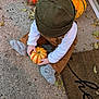 Charlie is registered to the contest to win money with this photo: toddler, pumpkin, autumn, fall, concrete, porch, hat, socks, clothing, baby, leaves, welcome_mat, seasonal, orange, yellow, brown, outdoor, child, sitting, hands