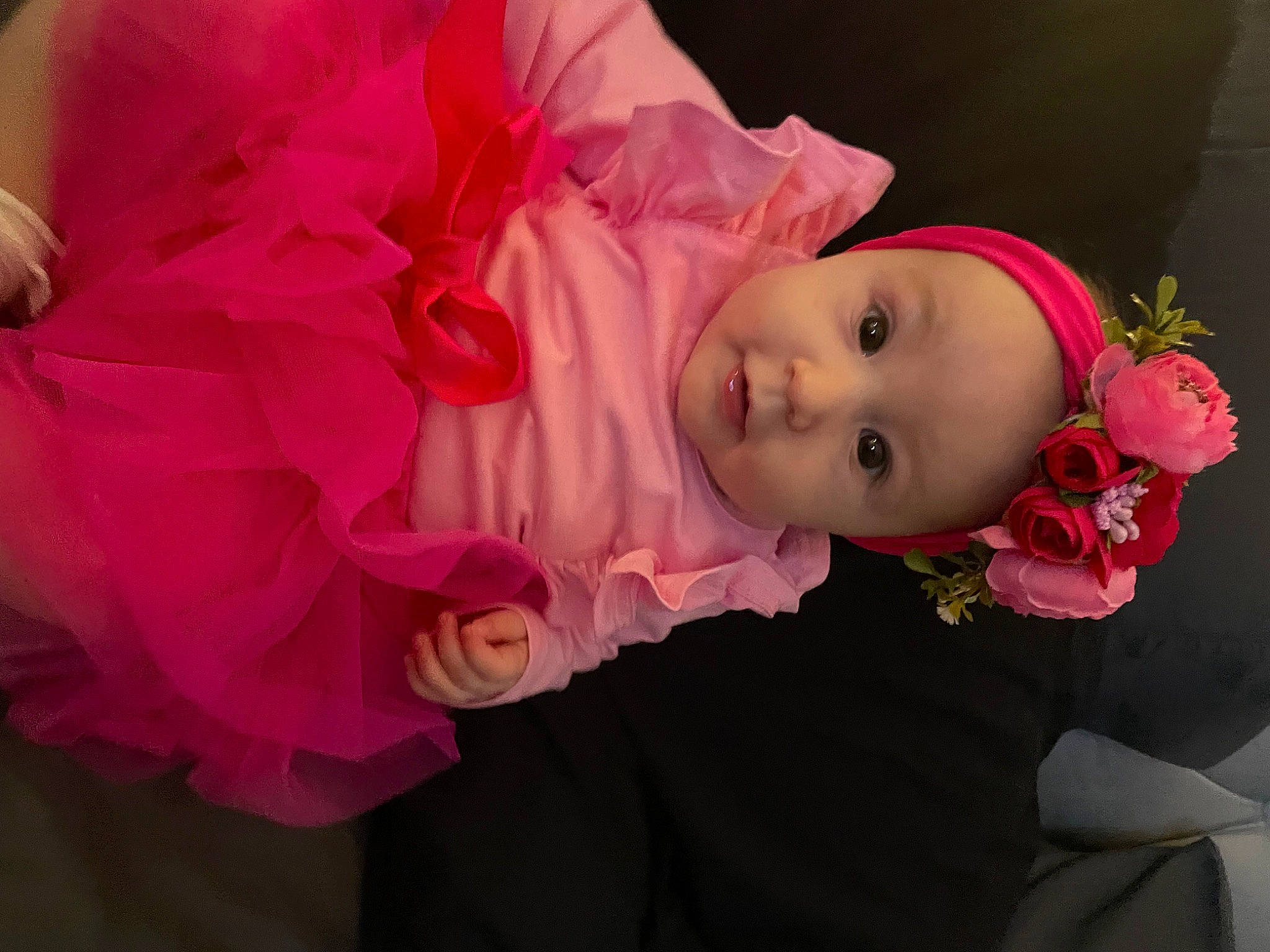 Emilia joined the competition — help win amazing prizes! baby, baby_products, baby_toddler_clothing, cheek, costume, cut_flowers, dress, event, eye, hair_accessory, hat, headwear, human_body, lip, magenta, person, petal, pink, plant, rose