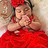 baby, infant, child, portrait, sleeping, hands, red_flower, headband, red_dress, tutu, necklace, bracelet, fluffy_blanket, white_background, wooden_sign, three_months, close_up, indoor, fashion, cute