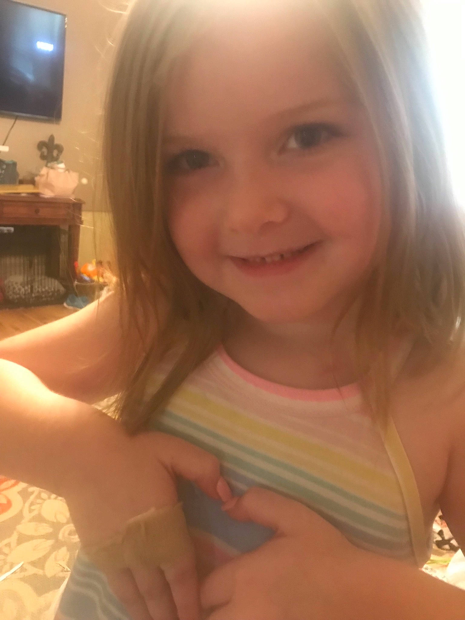 Daniella is registered to the contest to win money with this photo: beauty, blond, brown_hair, chest, eyebrow, face, finger, fun, hair, head, jaw, joy, lip, long_hair, mouth, nose, person, photography, selfie, skin