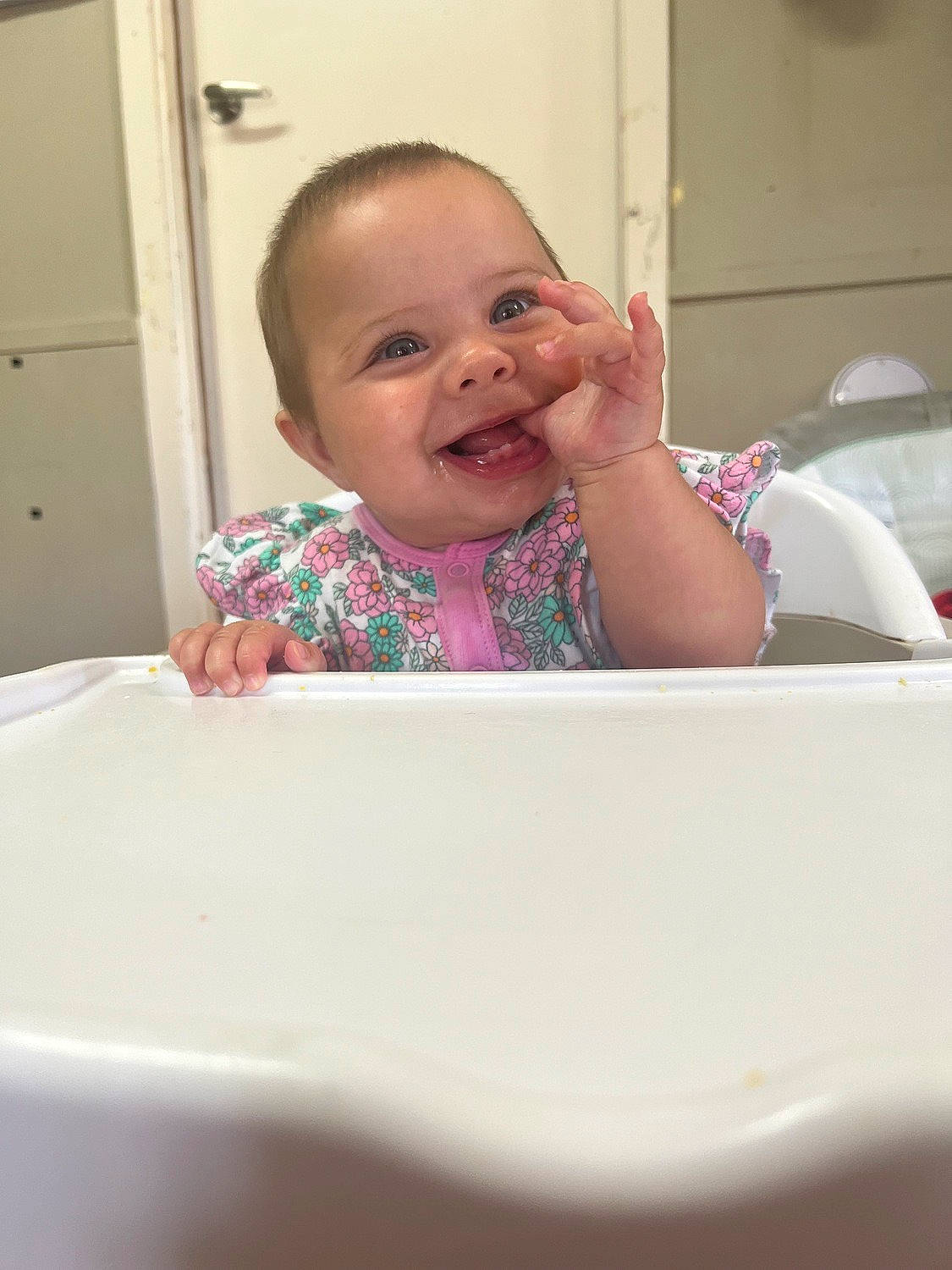 Millie joined the competition — help win amazing prizes! baby, baby_laughing, baby_toddler_clothing, bathing, cheek, child, comfort, door, eye, fun, happy, person, pink, product, rectangle, room, skin, sleeve, smile, thumb