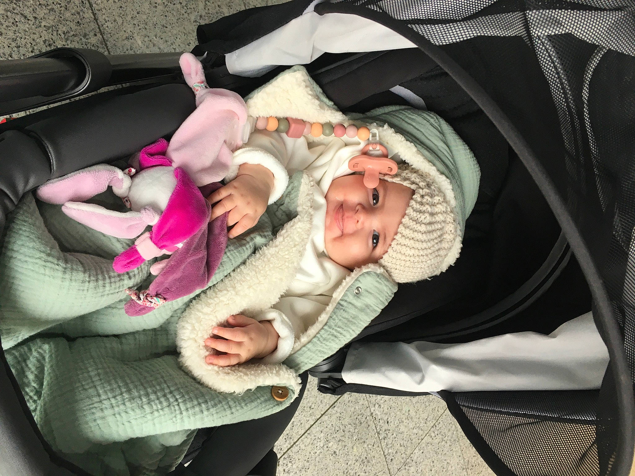 Eva participe au concours pour gagner de l'argent avec cette photo : auto_part, baby, baby_carriage, baby_in_car_seat, baby_products, baby_safety, baby_toddler_clothing, car_seat, cheek, child, comfort, fashion_accessory, hand, headwear, infant_bed, lap, linens, person, sitting, sleeve