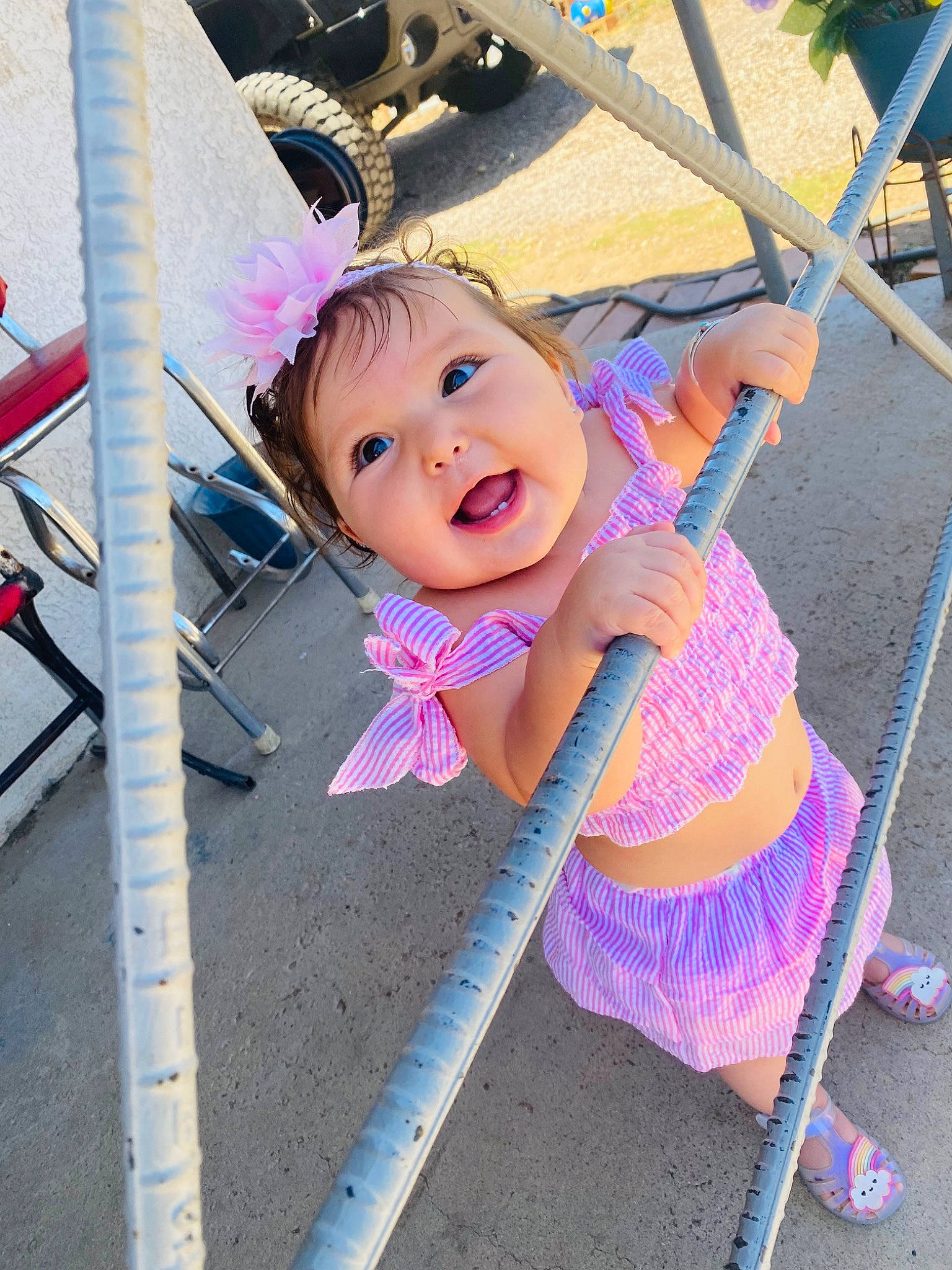 Aleeah joined the competition — help win amazing prizes! baby, baby_products, baby_toddler_clothing, child, city, fun, grass, happy, headwear, leisure, magenta, outdoor_play_equipment, person, pink, play, purple, recreation, smile, swing, toddler
