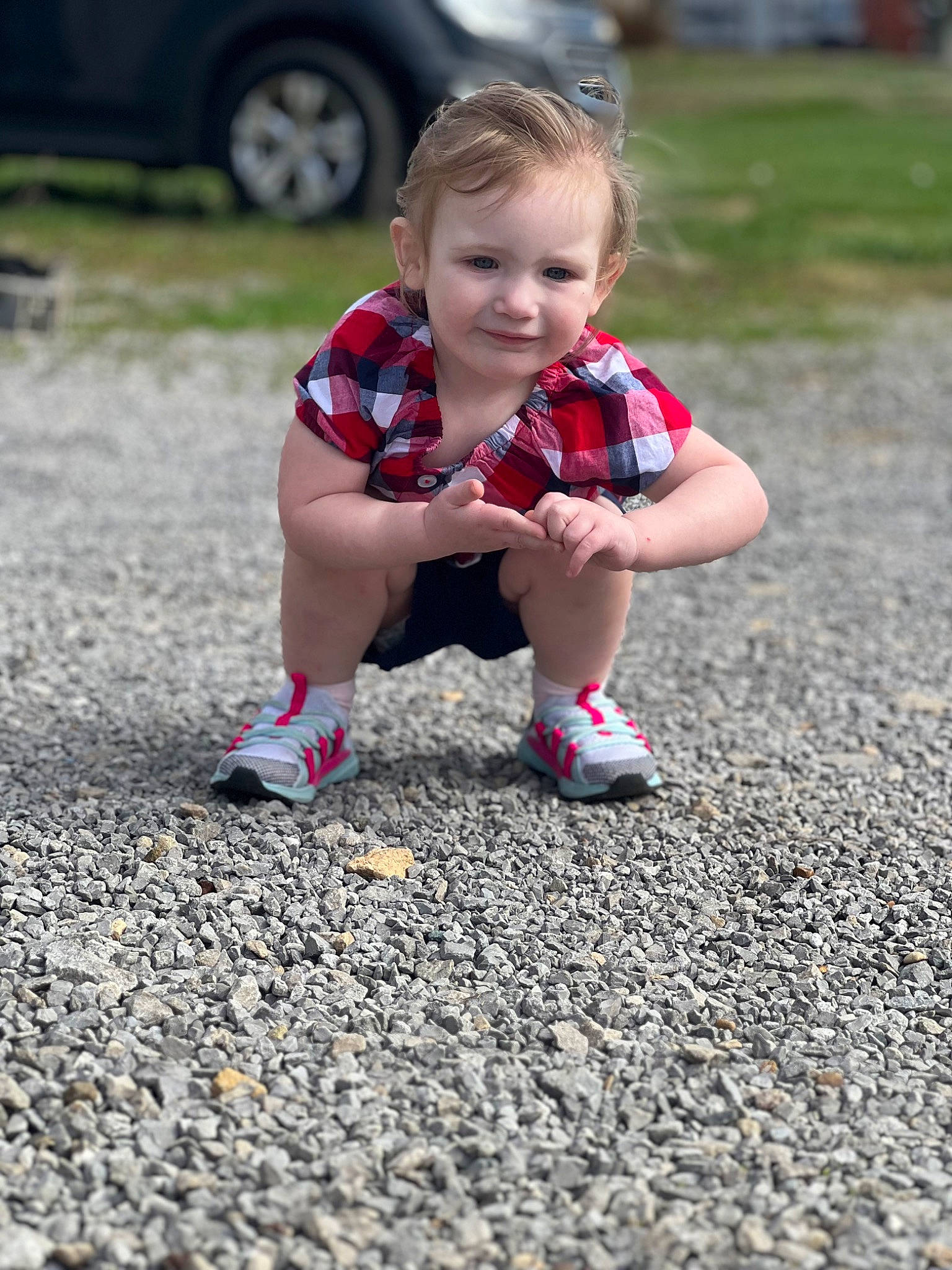 Elizabeth joined the competition — help win amazing prizes! asphalt, child, facial_expression, foot, footwear, fun, grass, hand, human_leg, joy, leg, leisure, people_in_nature, person, recreation, road, road_surface, shorts, sidewalk, sneakers
