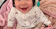 Lily Emelia is registered to the contest to win money with this photo: baby, child, smiling, happy, toy, plush_elephant, blanket, pink, white_clothing, indoor, cute, infant, sitting, face, hand, soft_toys, warm, comfort, playful, portrait