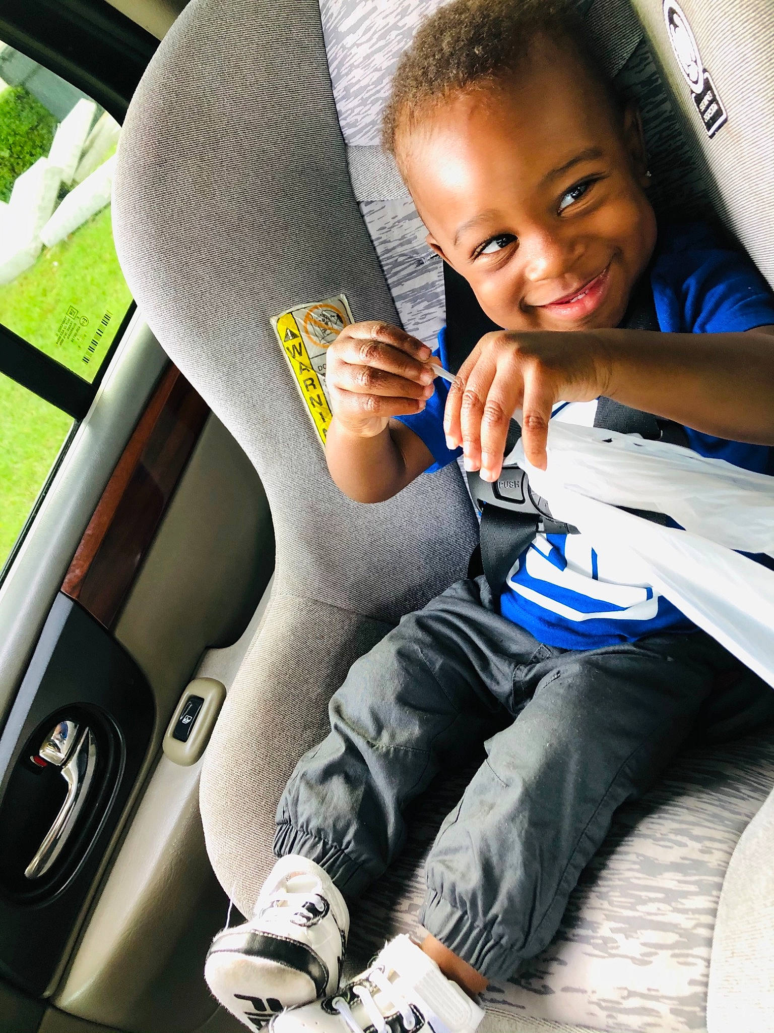 Jataveon is registered to the contest to win money with this photo: auto_part, automotive_design, automotive_exterior, car, car_seat, car_seat_cover, comfort, finger, hand, head_restraint, joy, mode_of_transport, motor_vehicle, person, smile, steering_part, steering_wheel, thumb, toddler, travel