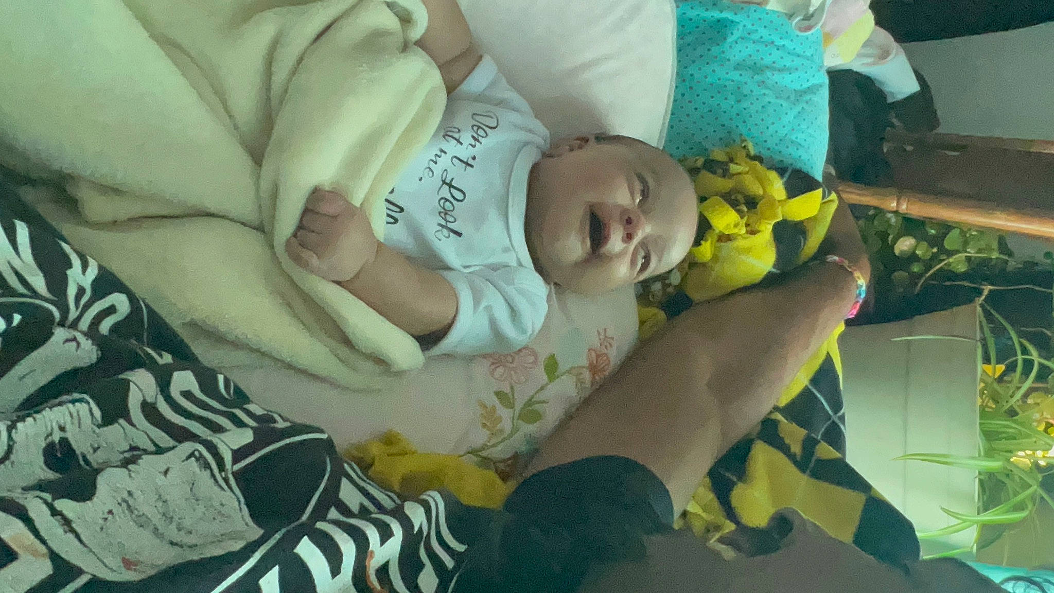 Millie joined the competition — help win amazing prizes! baby, baby_products, baby_safety, baby_toddler_clothing, bedtime, child, comfort, finger, grass, human_leg, linens, mouth, nap, pattern, person, room, sitting, sleep, toddler, tree