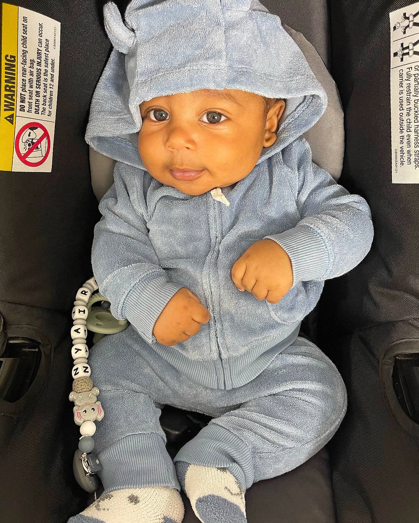 Nyaire joined the competition — help win amazing prizes! baby, baby_carriage, baby_products, baby_toddler_clothing, beanie, cap, car_seat, chair, cheek, child, comfort, eye, fashion_accessory, happy, headwear, hood, outerwear, person, sitting, sleeve