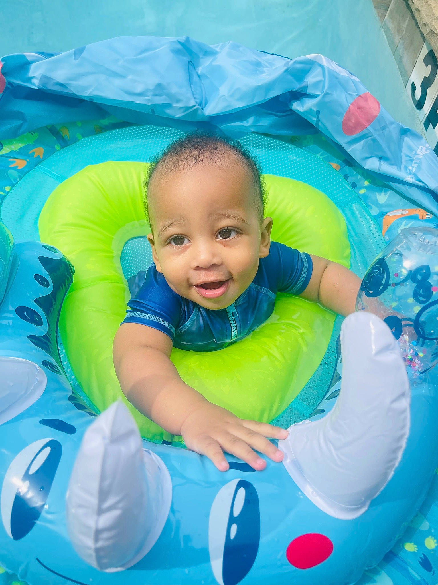 Nyaire joined the competition — help win amazing prizes! aqua, azure, baby, baby_toddler_clothing, child, circle, comfort, electric_blue, event, fun, happy, inflatable, leisure, person, play, product, recreation, sitting, smile, toddler