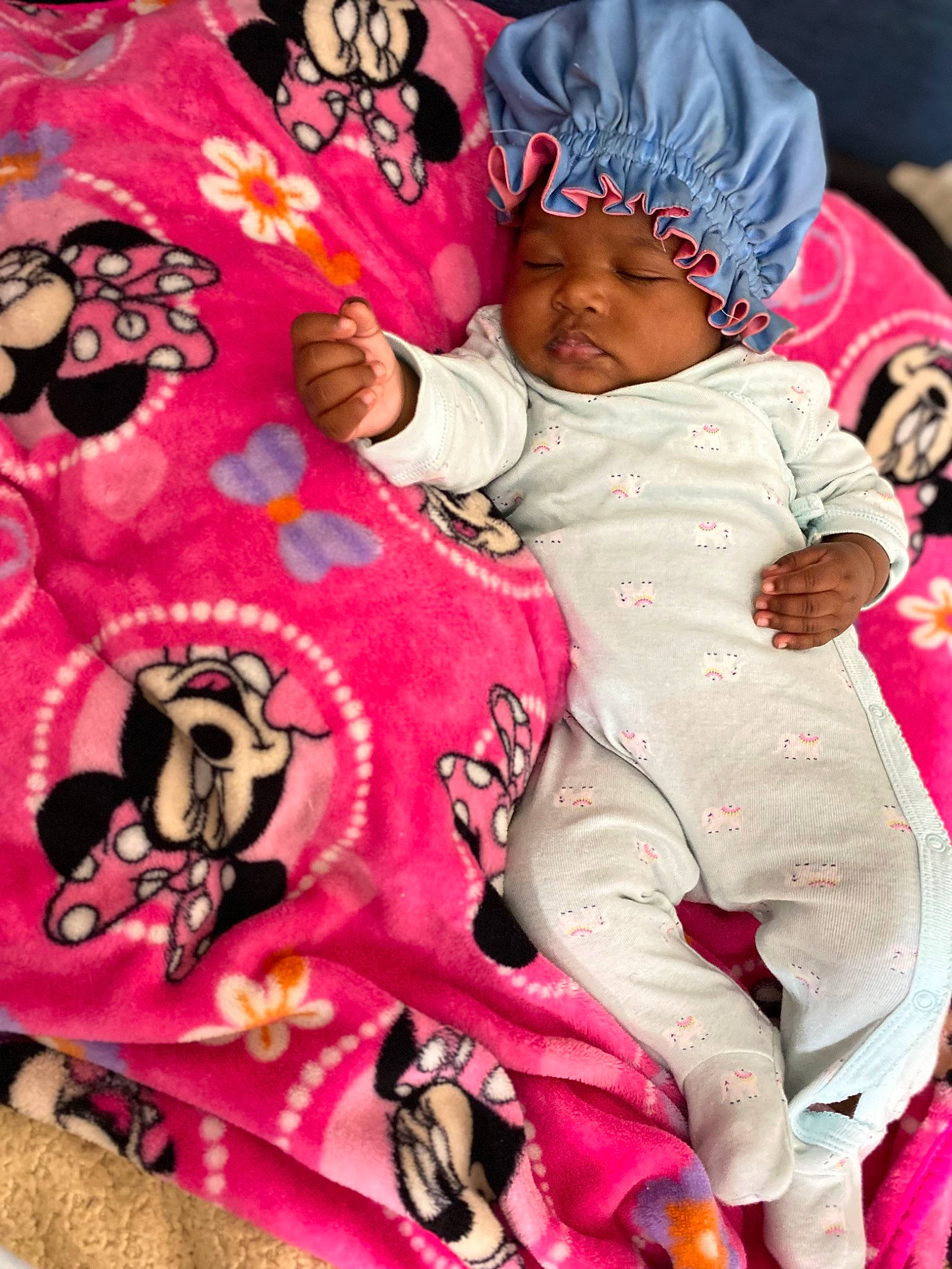 Bria is registered to the contest to win money with this photo: art, baby, baby_products, baby_toddler_clothing, child, event, fun, happy, headwear, linens, magenta, mammal, pattern, person, pink, room, sitting, sleeve, t_shirt, toddler