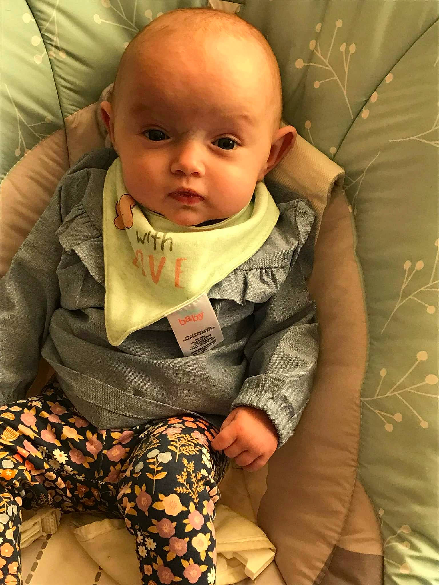 Bethany Lynn is registered to the contest to win money with this photo: baby, baby_products, baby_toddler_clothing, cheek, child, comfort, cool, eye, finger, flooring, human_body, linens, lip, mouth, neck, nose, person, sitting, skin, sleeve