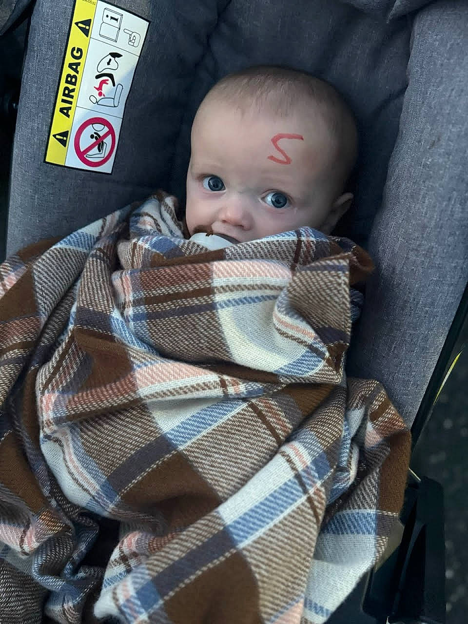 Boston joined the competition — help win amazing prizes! auto_part, baby, baby_carriage, baby_products, baby_toddler_clothing, car_seat, cheek, child, comfort, doll, linens, outerwear, pattern, person, plaid, sitting, sleeve, tartan, textile, toddler