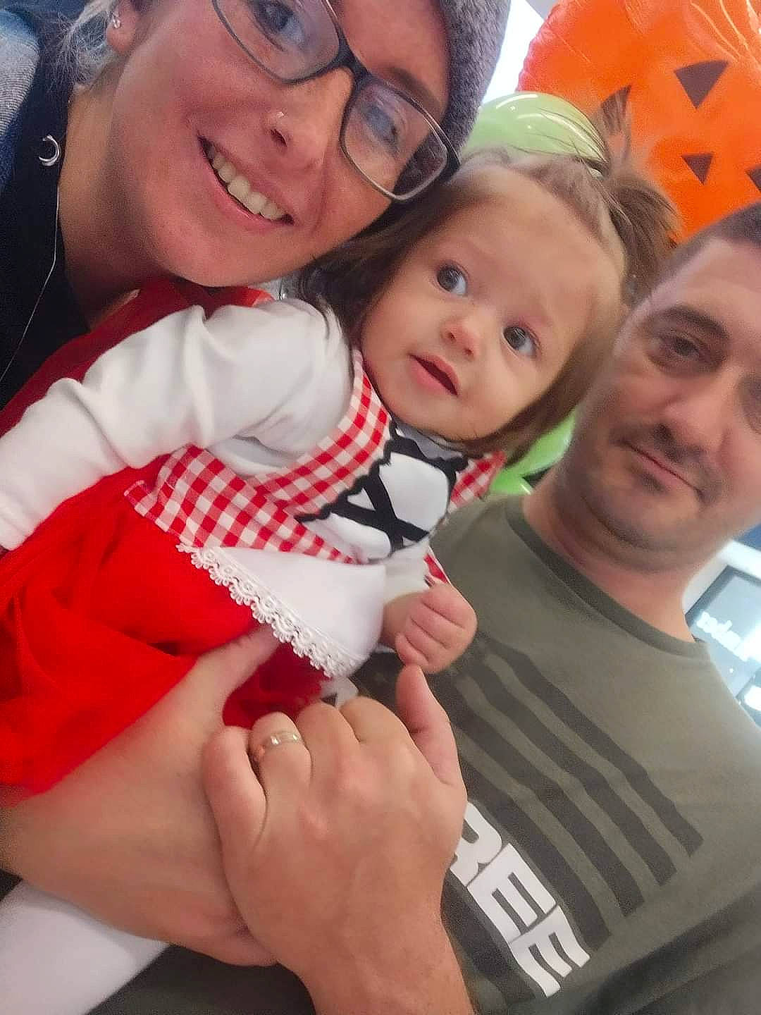 Emily joined the competition — help win amazing prizes! baby, baby_toddler_clothing, carmine, child, event, eye, face, finger, fun, gesture, hand, happy, joy, leisure, person, recreation, red, skin, smile, t_shirt