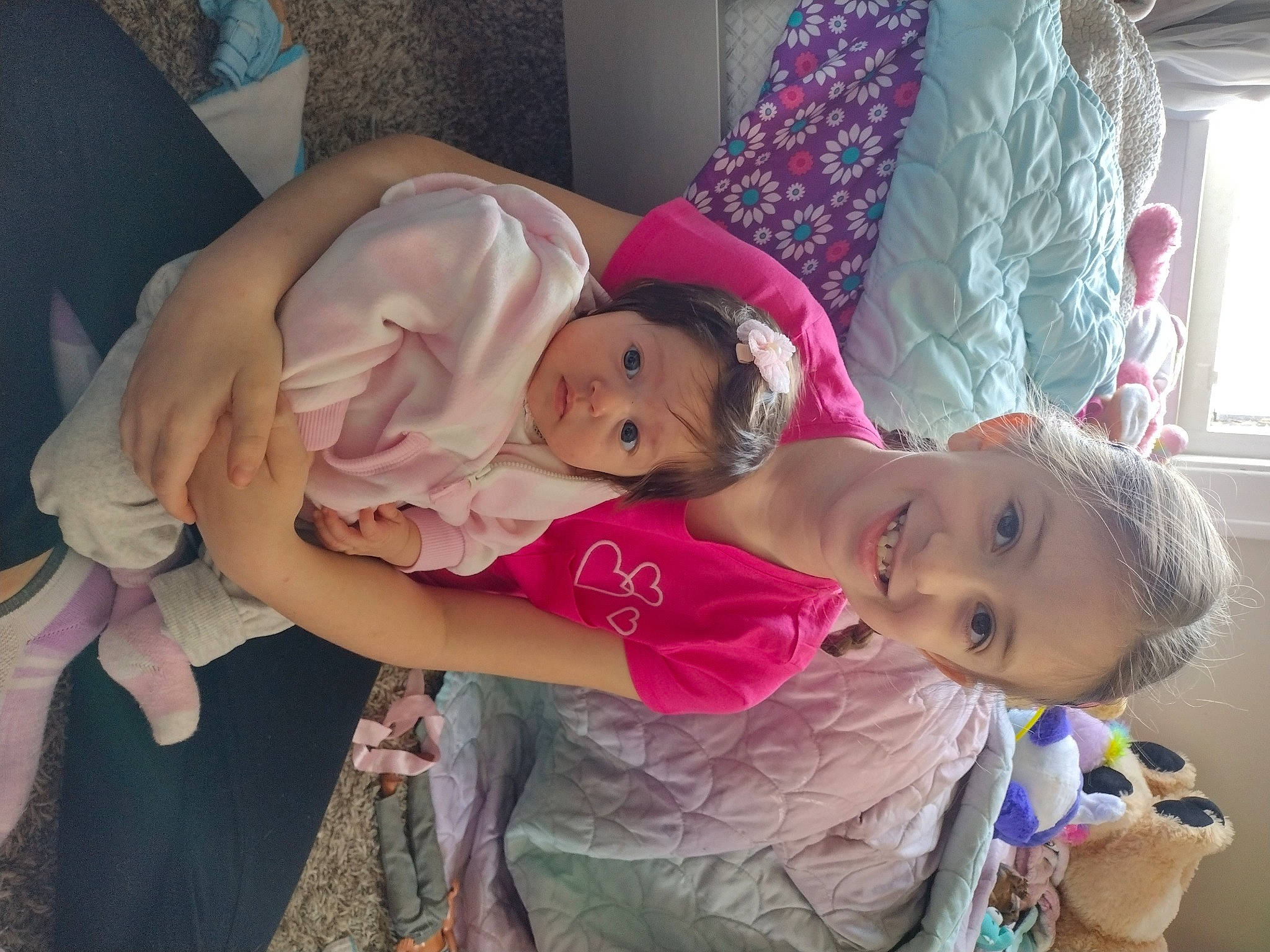 Giada is registered to the contest to win money with this photo: baby, baby_products, baby_toddler_clothing, child, comfort, curtain, dress, event, fun, happy, hat, headpiece, joy, magenta, person, pink, purple, room, sitting, smile